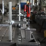 Sujeción para mesas de soldadura con alcance variable TWV – Germantools